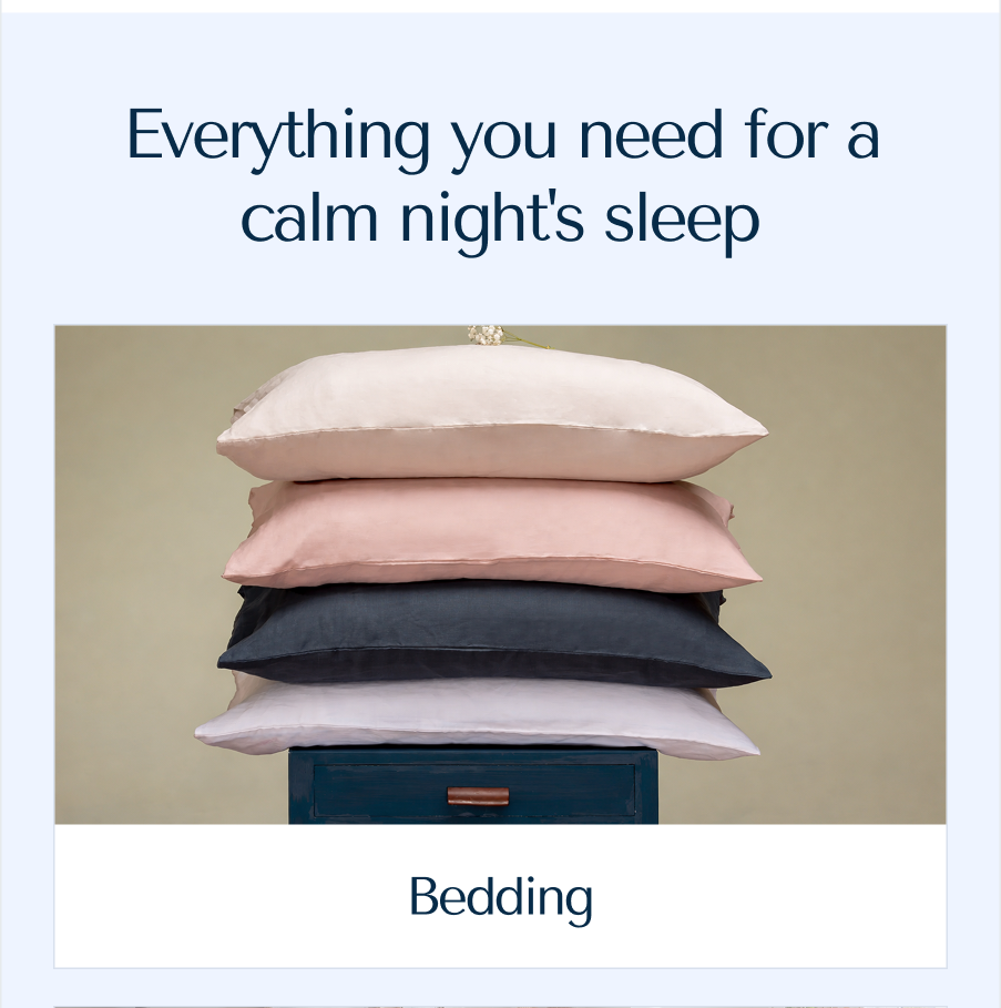 A vertical stack of four premium pillows